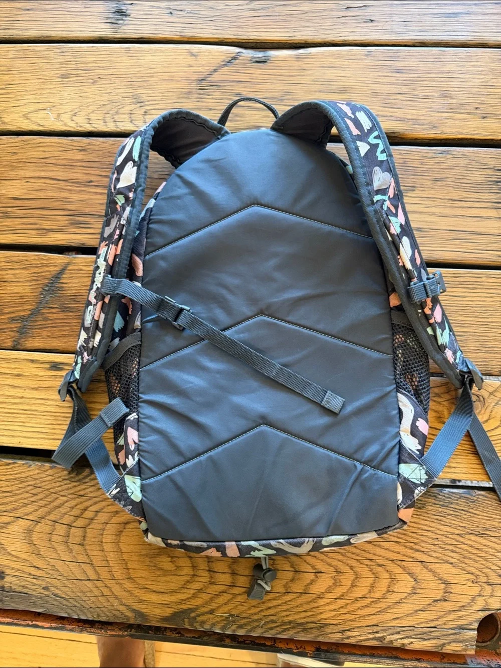 Dakine Kids Backpack in Black with Pastel Pink, Mint, Peach